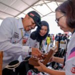 PRODUK UMKM DI PERTAMINA GRAND PRIX OF INDONESIA 2025 DAPAT SOROTAN WISATAWAN MANCANEGARA